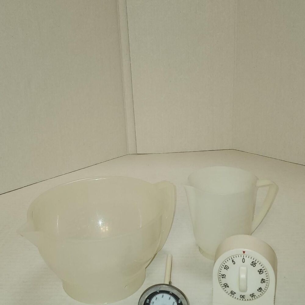 Lot of measuring cup & bowl, kitchen timer, Oneida food thermometer some vintage